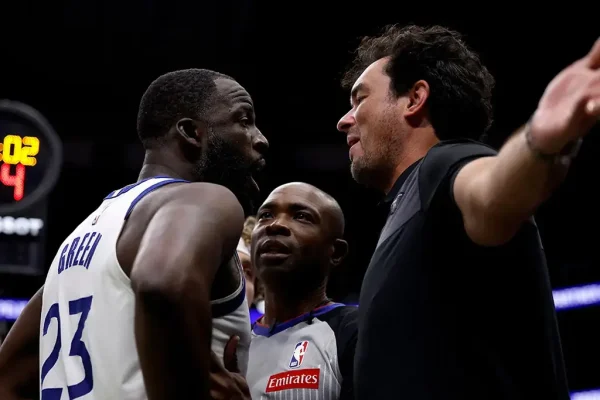 NBA Reprimands Draymond Green for Courtside Fan Confrontation_